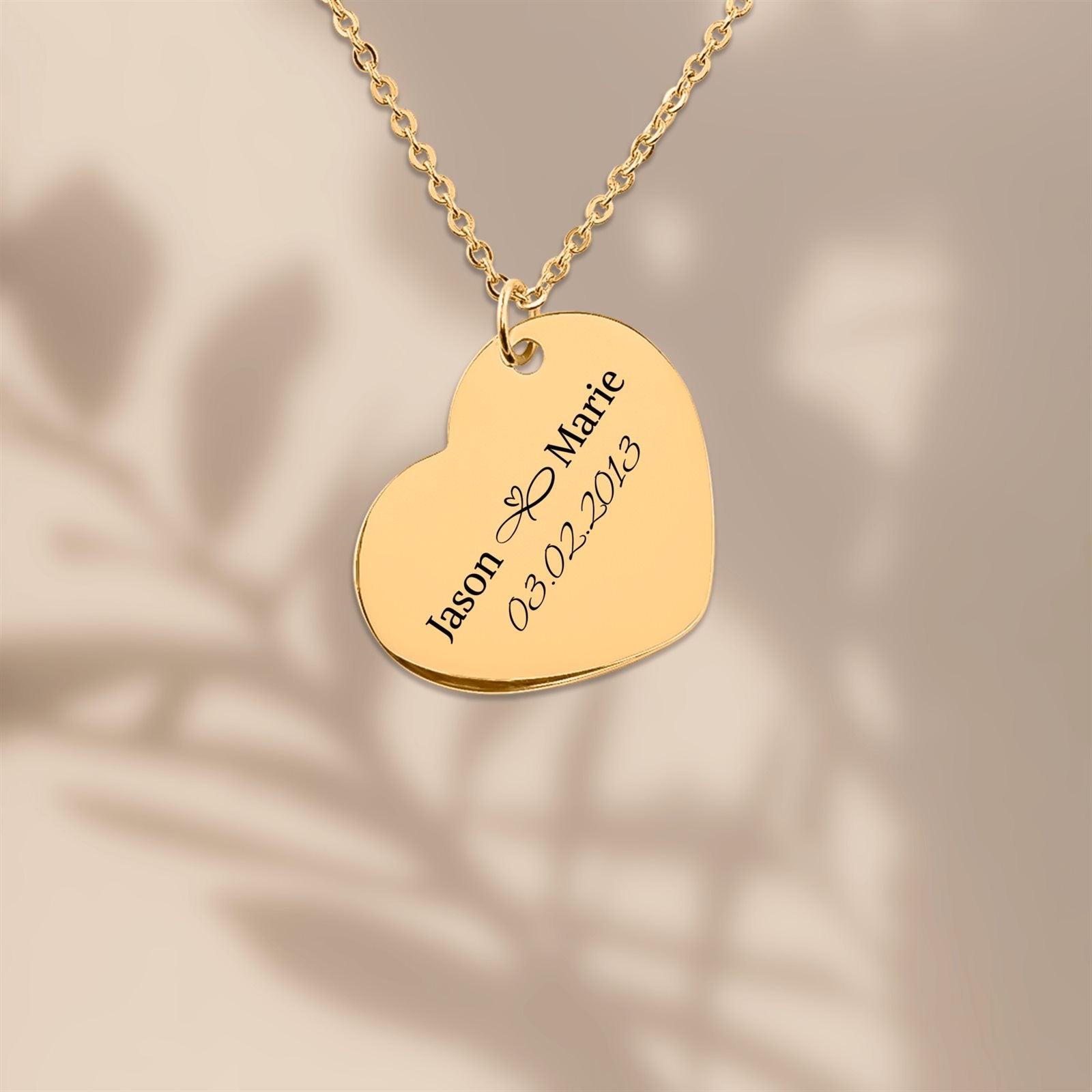 Heart pendant in 18k gold plated steel, engraved with two names and a date